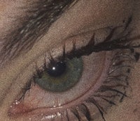 a close up of a woman's eye